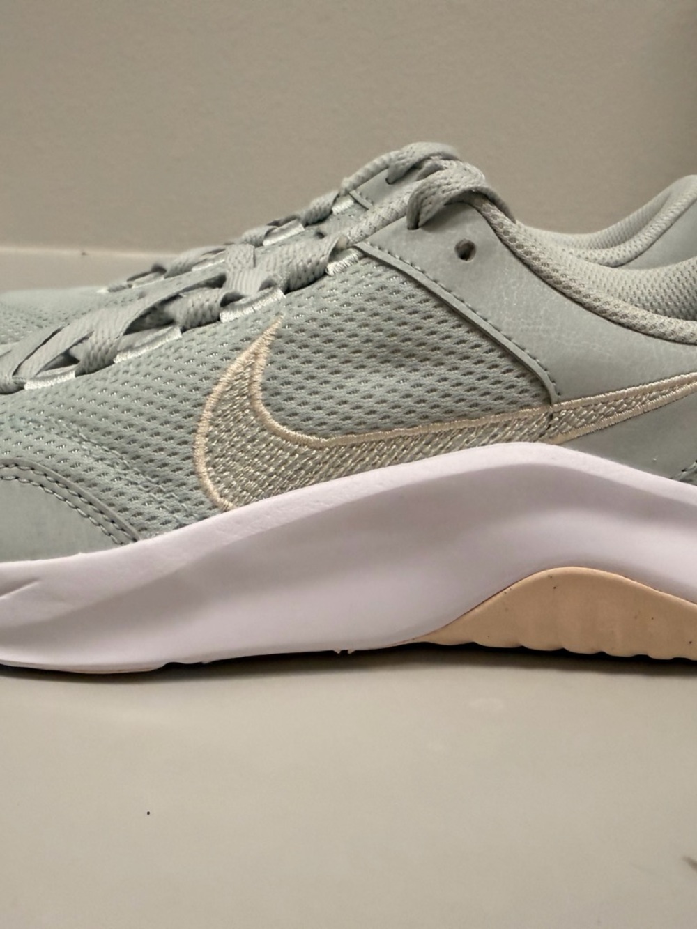 Brand New w/o box Nike Legend Essentials Light Guava Gold Swoosh